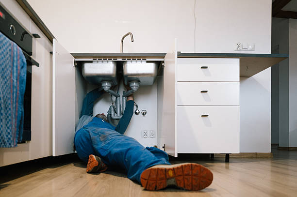Professional Drain Cleaning technician working in Nevada, IA